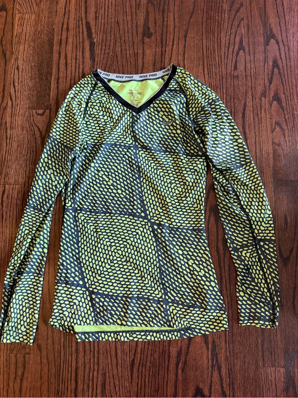 Nike Women’s Long-Sleeve V-Neck Performance Top in Yellow and Black